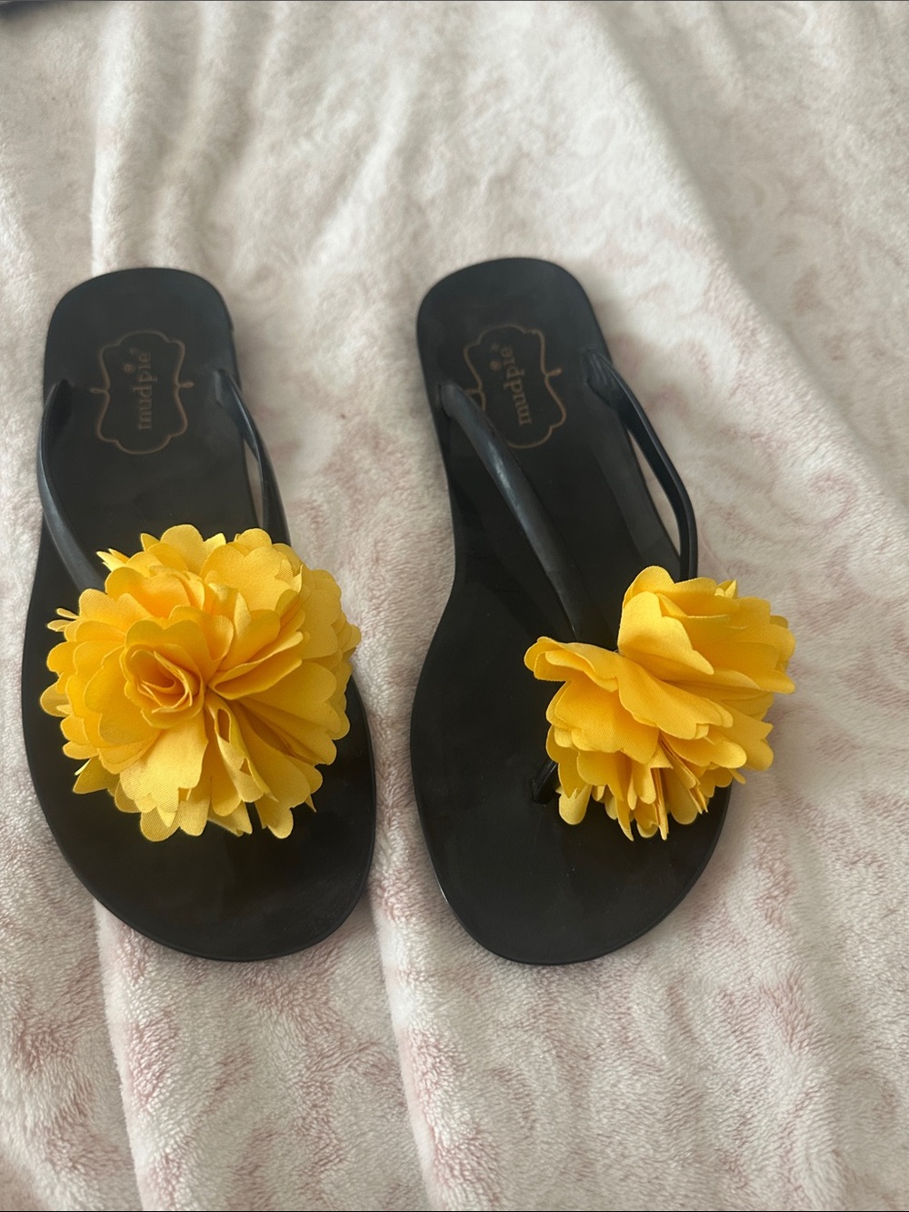 Mud Pie Black Flip Flop Sandals with Yellow Flower Accent